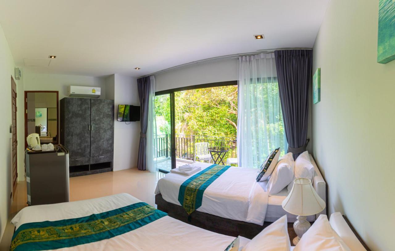 Rossarin Sea View Patong Hotel Exterior photo