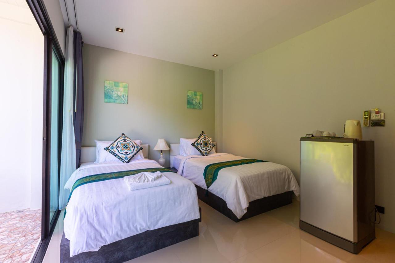Rossarin Sea View Patong Hotel Exterior photo