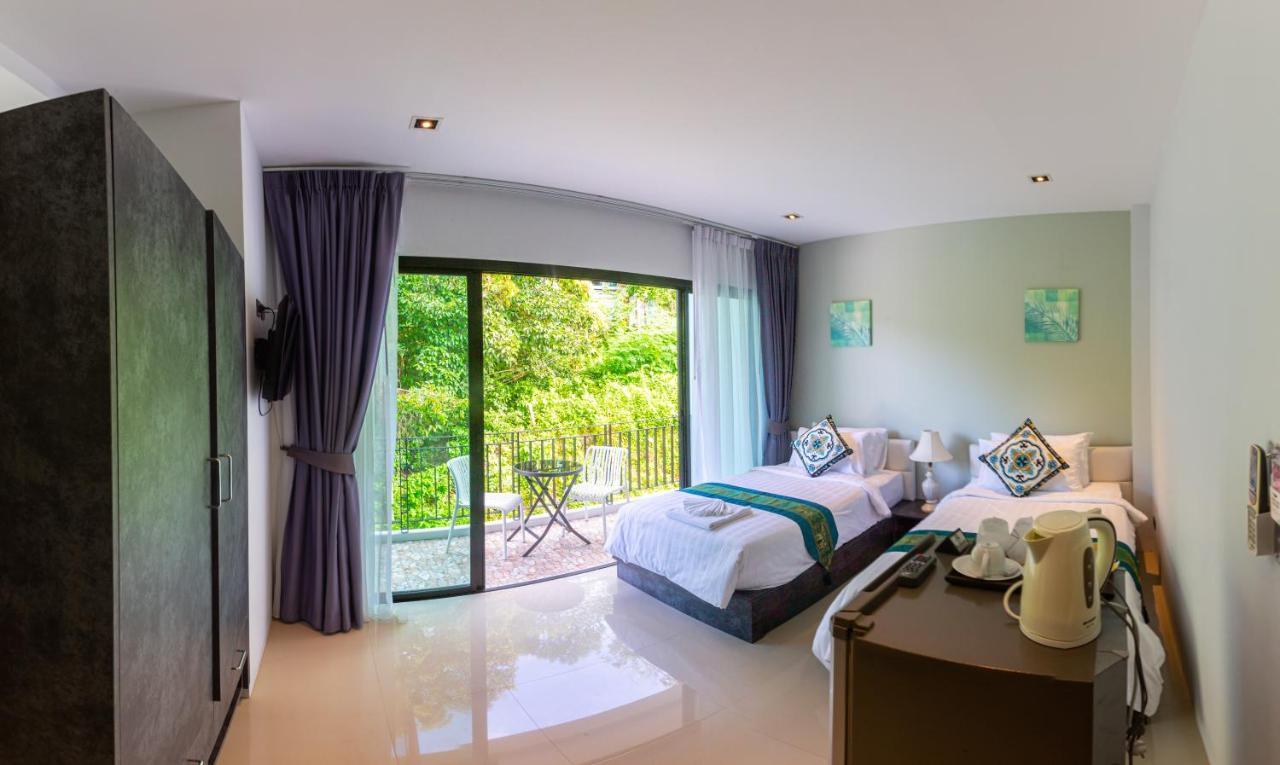 Rossarin Sea View Patong Hotel Exterior photo