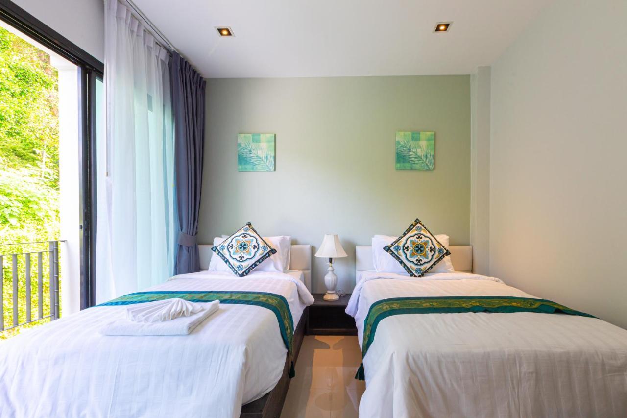 Rossarin Sea View Patong Hotel Exterior photo