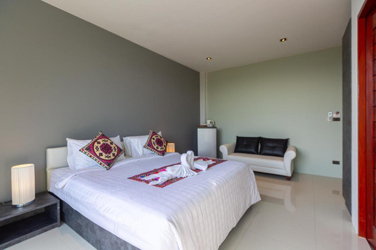 Rossarin Sea View Patong Hotel Exterior photo