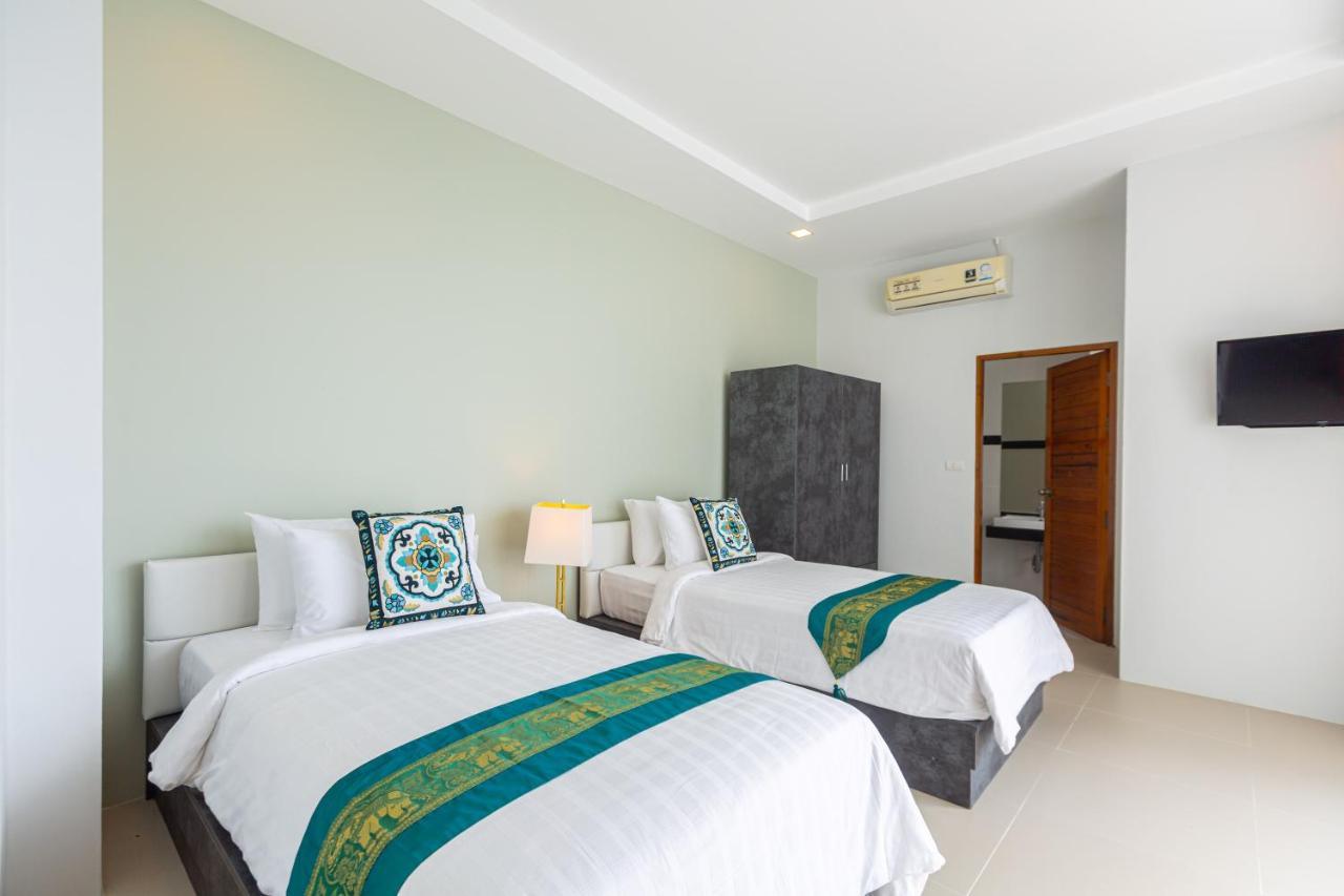 Rossarin Sea View Patong Hotel Exterior photo