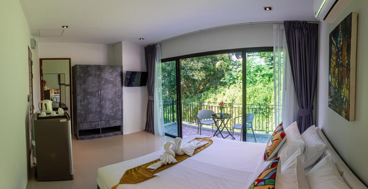 Rossarin Sea View Patong Hotel Exterior photo