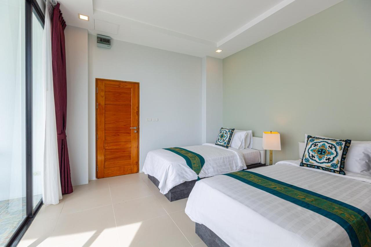 Rossarin Sea View Patong Hotel Exterior photo