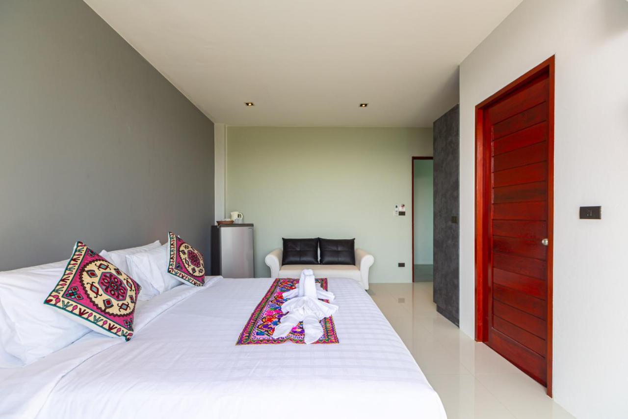 Rossarin Sea View Patong Hotel Exterior photo