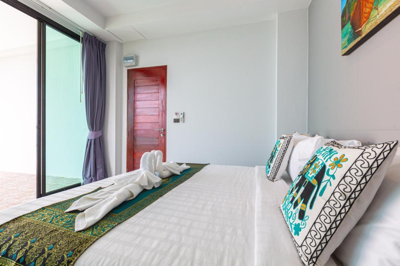 Rossarin Sea View Patong Hotel Exterior photo