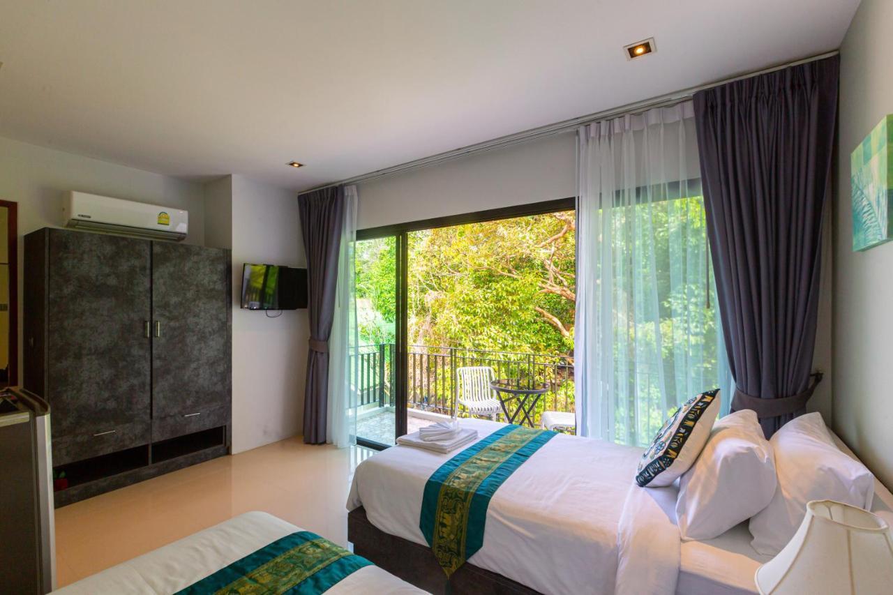 Rossarin Sea View Patong Hotel Exterior photo