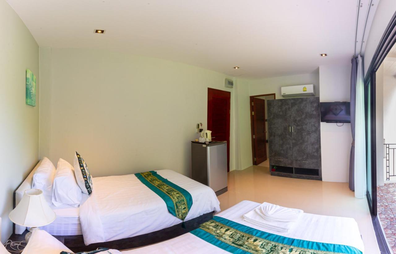 Rossarin Sea View Patong Hotel Exterior photo